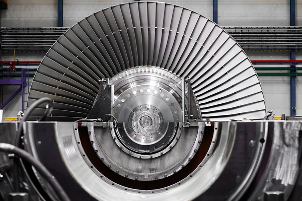 A powerful steam turbine rotor is installed in the lodgment of the steam turbine base.